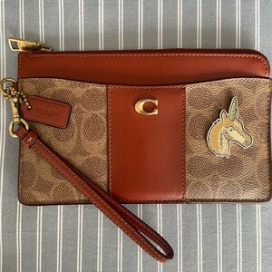 Coach Brown and Tan Wristlet with Unicorn Charm
